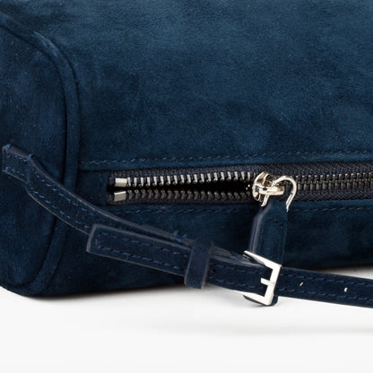Minimalist women's suede handbag with adjustable shoulder strap