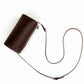 Coffee-colored mini handbag with adjustable shoulder strap